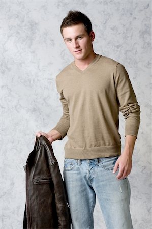 Cute male model in v-neck sweater Foto de stock - Royalty-Free Super Valor e Assinatura, Número: 400-05035853