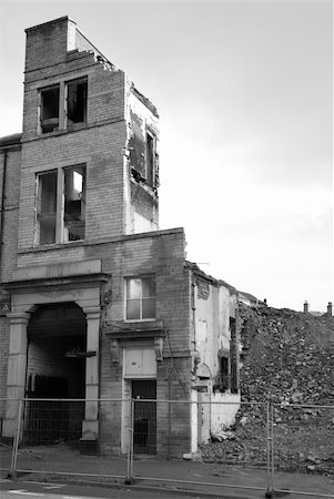 An old building cordoned off and in a state of demolition Stock Photo - Budget Royalty-Free & Subscription, Code: 400-05035954