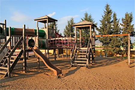 empty playground - An empty children playground in the afternoon Stock Photo - Budget Royalty-Free & Subscription, Code: 400-05036142