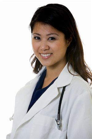 simsearch:400-03995908,k - Female attractive Asian doctor wearing white lab coat wearing a stethoscope around shoulders smiling on white background Stock Photo - Budget Royalty-Free & Subscription, Code: 400-05036547