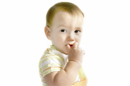 baby boy with finger in his mouth over white Stock Photo - Budget Royalty-Free & Subscription, Code: 400-05036657