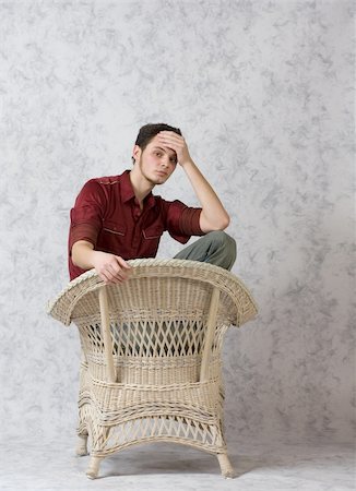 Maler model in a whicker chair Foto de stock - Royalty-Free Super Valor e Assinatura, Número: 400-05036791