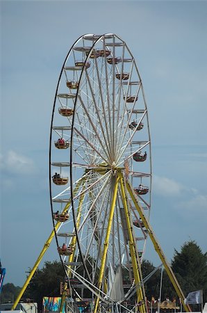 paris carousel - Ferriswheel in a fairground Stock Photo - Budget Royalty-Free & Subscription, Code: 400-05036934