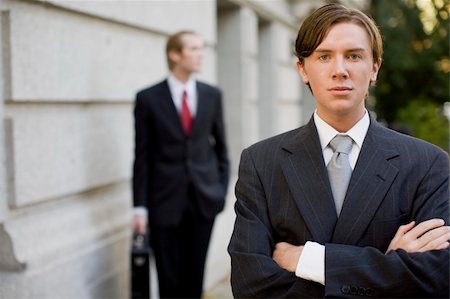 simsearch:400-05118165,k - two businessmen standing in front of building wearing suits looking at camera Stock Photo - Budget Royalty-Free & Subscription, Code: 400-05037307