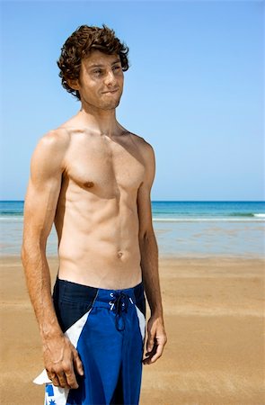 Portrait of a young man on the beach Photographie de stock - Aubaine LD & Abonnement, Code: 400-05037900