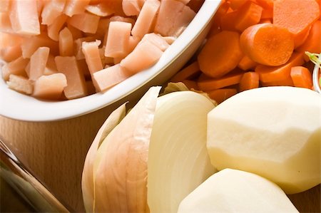 potato conceptual - getting ready to make chicken noodle soup Stock Photo - Budget Royalty-Free & Subscription, Code: 400-05037970