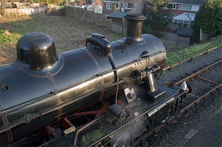 simsearch:400-04288171,k - Close up of the boiler and chimney on an old steam locomotive. Foto de stock - Super Valor sin royalties y Suscripción, Código: 400-05038186