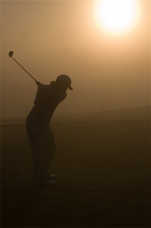 Golfers and a resort golf course in action Photographie de stock - Aubaine LD & Abonnement, Code: 400-05038615
