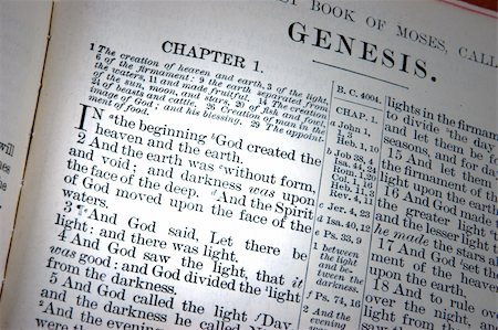 A bible opened to the first chapter of Genesis, the creation. Stockbilder - Microstock & Abonnement, Bildnummer: 400-05038641