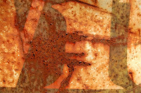 simsearch:600-06007915,k - Type stencil on rusty metal barrel surface. Abstract background texture. Stock Photo - Budget Royalty-Free & Subscription, Code: 400-05039377