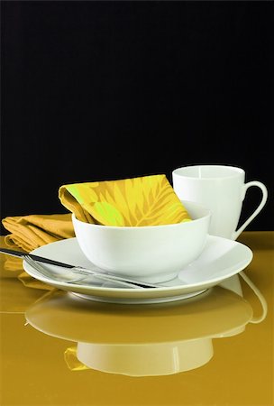 simsearch:400-04013113,k - A modern table setting with white dishes on a colorful background Photographie de stock - Aubaine LD & Abonnement, Code: 400-05030558