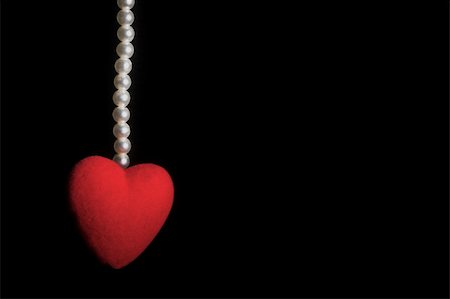 string of pearls for wedding - A string of pearls and a red heart. Stock Photo - Budget Royalty-Free & Subscription, Code: 400-05030742