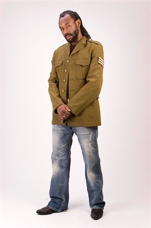 simsearch:400-05030782,k - A Black man in a Army jacket isolated on a white background. Stock Photo - Budget Royalty-Free & Subscription, Code: 400-05030777