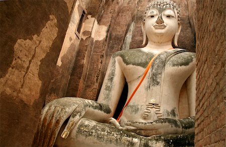huge seated buddha in the ancient city of sukothai in thailand Stock Photo - Budget Royalty-Free & Subscription, Code: 400-05030897
