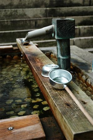 Hold Water at the entrance to a temple Stock Photo - Budget Royalty-Free & Subscription, Code: 400-05031153