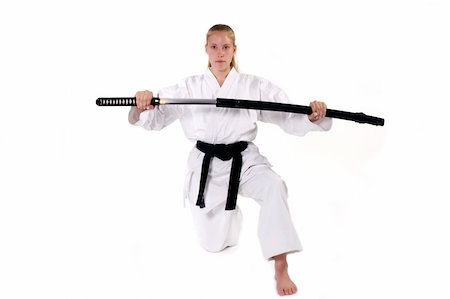 Female Third Degree Black Belt with Katana. Photographie de stock - Aubaine LD & Abonnement, Code: 400-05031204
