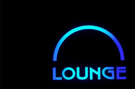 A neon lounge sign outside of a bar. Stock Photo - Budget Royalty-Free & Subscription, Code: 400-05031306