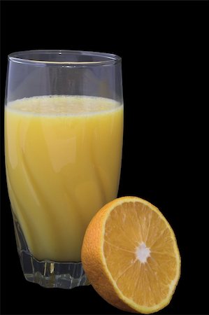 simsearch:695-05770968,k - Fresh orange juice in a drinking glass. Photographie de stock - Aubaine LD & Abonnement, Code: 400-05031968