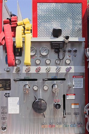 first responder - The ladder controls and hoses on a firetruck. Stock Photo - Budget Royalty-Free & Subscription, Code: 400-05032122