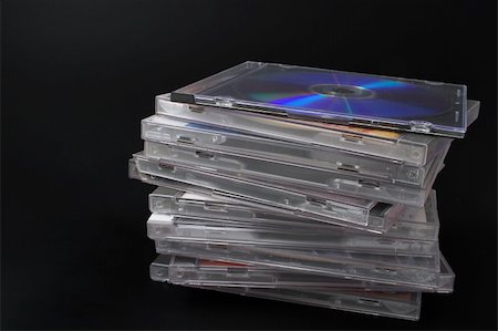 A stack of compact discs with recorded music. Stock Photo - Budget Royalty-Free & Subscription, Code: 400-05032138