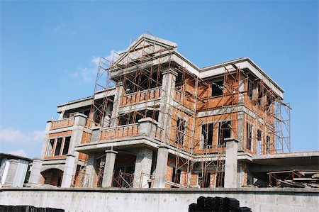 solids architecture unfinished - Construction of a new bungalow house site with scaffolding Stock Photo - Budget Royalty-Free & Subscription, Code: 400-05032431