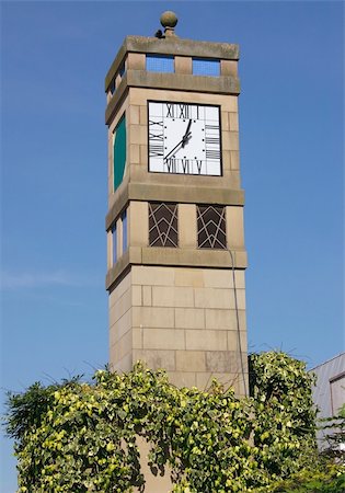 clock tower against a blue sky Stock Photo - Budget Royalty-Free & Subscription, Code: 400-05032657