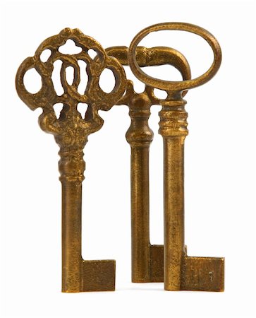 simsearch:400-03955247,k - close-up of three ornamented old keys against white background Photographie de stock - Aubaine LD & Abonnement, Code: 400-05032691