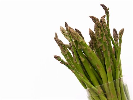 sparkia (artist) - green asparagus spears staying fresh in a glass of water Stockbilder - Microstock & Abonnement, Bildnummer: 400-05033347