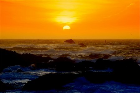 Sun setting over the Pacific Ocean near Monterey, California Stock Photo - Budget Royalty-Free & Subscription, Code: 400-05033384