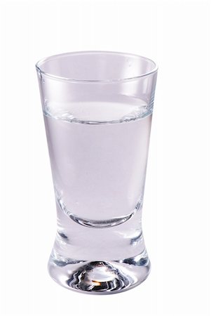 Shotglass of vodka isolated on white background Stock Photo - Budget Royalty-Free & Subscription, Code: 400-05033891