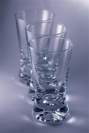 Shotglass for vodka in close-up Stock Photo - Budget Royalty-Free & Subscription, Code: 400-05033892