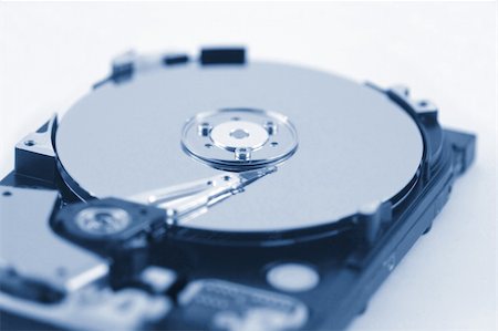 festplatte - Harddisk closeup with selective focus and cold blue colors Stockbilder - Microstock & Abonnement, Bildnummer: 400-05033943