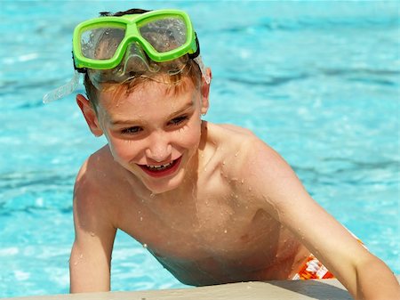 sparkia (artist) - young boy climbing out of a swimming pool Stockbilder - Microstock & Abonnement, Bildnummer: 400-05044018
