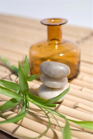 zen stones on bamboo background meditation concept Stockbilder - Microstock & Abonnement, Bildnummer: 400-05044072
