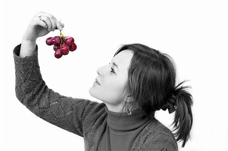 young girl is holding grapes in the palm Stock Photo - Budget Royalty-Free & Subscription, Code: 400-05044136