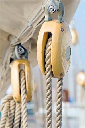 sailing block pulley - Old wooden pulleys on a sailing boat Stock Photo - Budget Royalty-Free & Subscription, Code: 400-05044697
