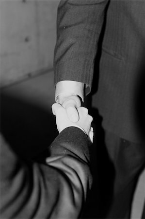 close up of handshake between two businessmen Stock Photo - Budget Royalty-Free & Subscription, Code: 400-05044724