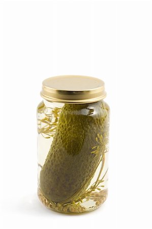 pickling gherkin - single pickled cucumber in a bottle, isolated on white Stock Photo - Budget Royalty-Free & Subscription, Code: 400-05044780