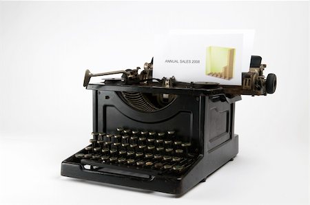 An old ancient typewriter used to write a sales report... Font used is Arial. Photographie de stock - Aubaine LD & Abonnement, Code: 400-05044806