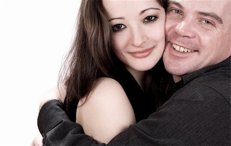 simsearch:400-03965426,k - Studio shot of young loving couple caring Stock Photo - Budget Royalty-Free & Subscription, Code: 400-05044873