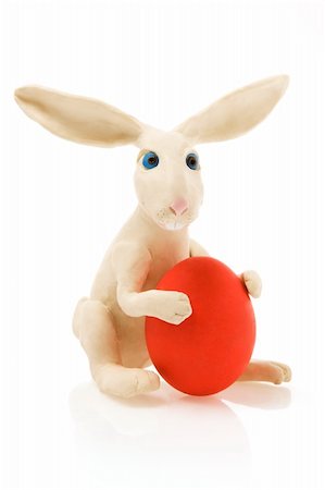 simsearch:400-05040794,k - White toy rabbit with red egg.The image contains a path Stock Photo - Budget Royalty-Free & Subscription, Code: 400-05044903