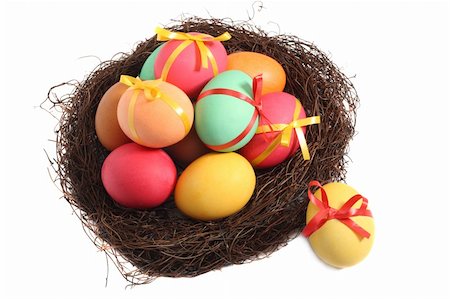 Easter nest with colored eggs, isolated on white background Stock Photo - Budget Royalty-Free & Subscription, Code: 400-05045320
