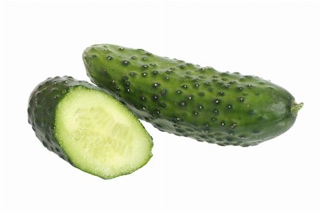 Fresh cucumber and a half, isolated on white background Stock Photo - Budget Royalty-Free & Subscription, Code: 400-05045323