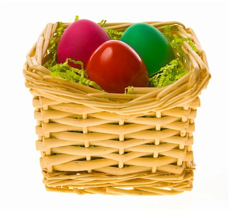 simsearch:400-05040794,k - Three multi-coloured Easter eggs in a basket on a white background Stock Photo - Budget Royalty-Free & Subscription, Code: 400-05045613