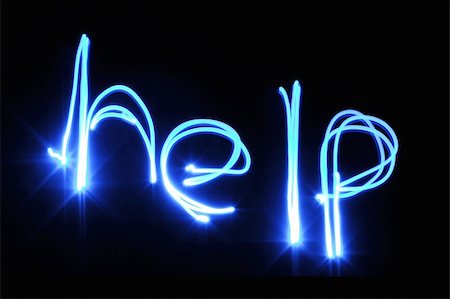 the word 'help' written in light Photographie de stock - Aubaine LD & Abonnement, Code: 400-05045855