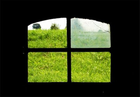 Broken window. View on green fields from dark room Stock Photo - Budget Royalty-Free & Subscription, Code: 400-05045955