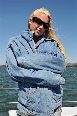 Beautiful blonde bundled up against the cold of a boat ride in San Francisco Bay Stock Photo - Budget Royalty-Free & Subscription, Code: 400-05046287