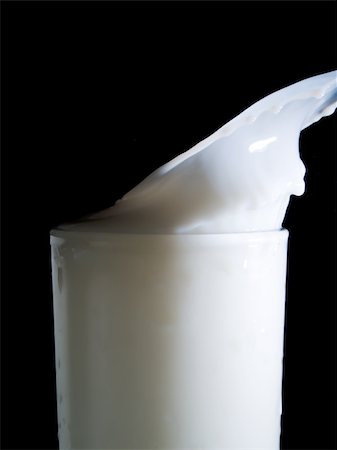 simsearch:859-03038177,k - Glass of milk on a black background Stock Photo - Budget Royalty-Free & Subscription, Code: 400-05046973