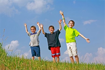 simsearch:400-04953342,k - Boys Having Fun Playing on a Hill Stock Photo - Budget Royalty-Free & Subscription, Code: 400-05047317