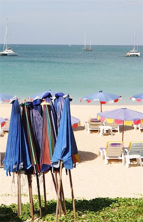 simsearch:700-00555130,k - Beach umbrellas at the beach on a summer day. Fotografie stock - Microstock e Abbonamento, Codice: 400-05047623